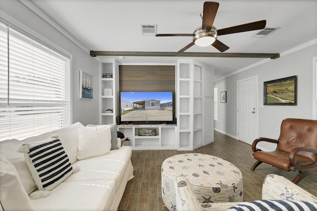 living area featuring dark wood-style floors, baseboards, visible vents, and crown molding