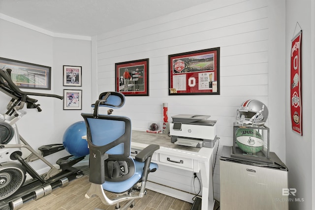 workout area featuring wood finish floors