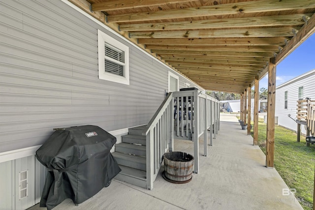 view of patio featuring a grill