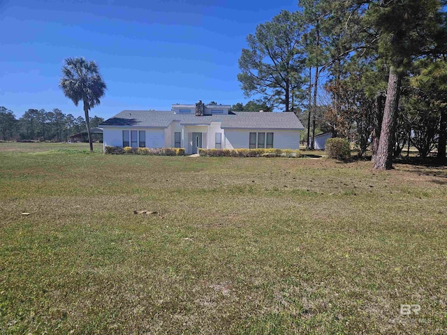 view of front of house with a front yard