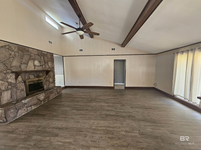 unfurnished living room with dark wood-style floors, ceiling fan, visible vents, and a stone fireplace