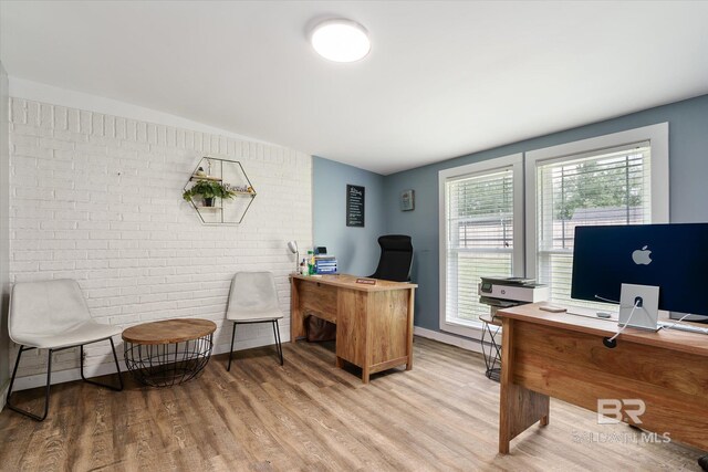 office with light hardwood / wood-style flooring