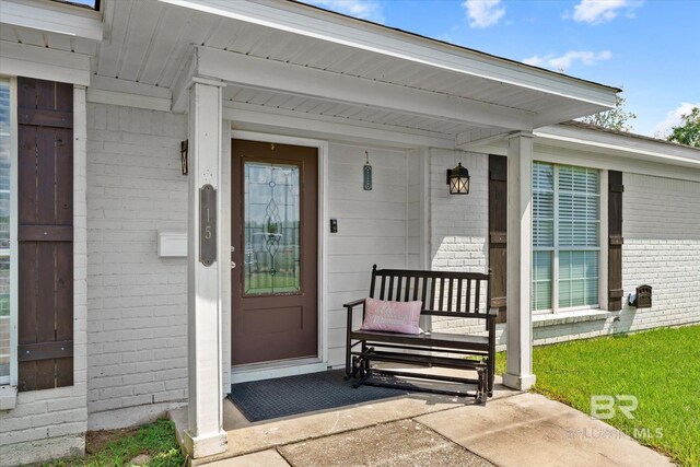 doorway to property featuring a porch