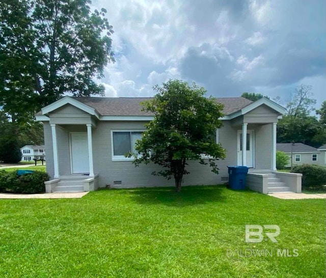 view of front of home with a front yard