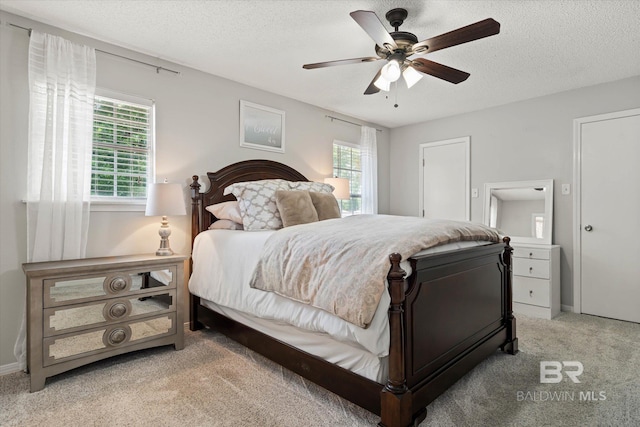 1116 Linlen Ave, Mobile, AL 36609 - carpeted bedroom featuring a textured ceiling and ceiling fan
