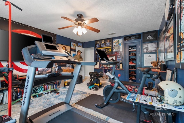 1116 Linlen Ave, Mobile, AL 36609 - workout room with ceiling fan and a textured ceiling
