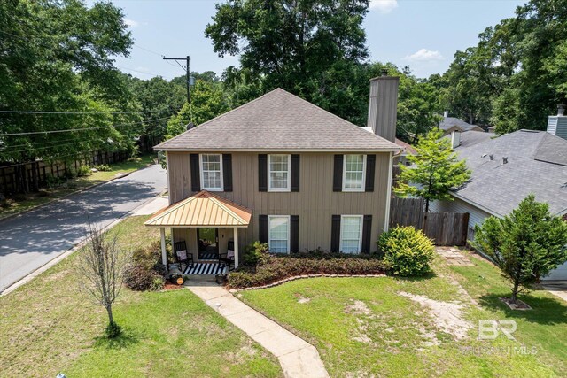 1116 Linlen Ave, Mobile, AL 36609 - view of front of home with a chimney and a shingled roof