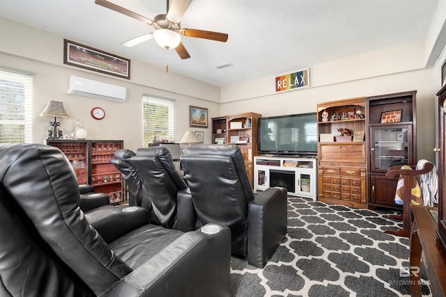 living area with visible vents, dark carpet, a wall mounted AC, and ceiling fan