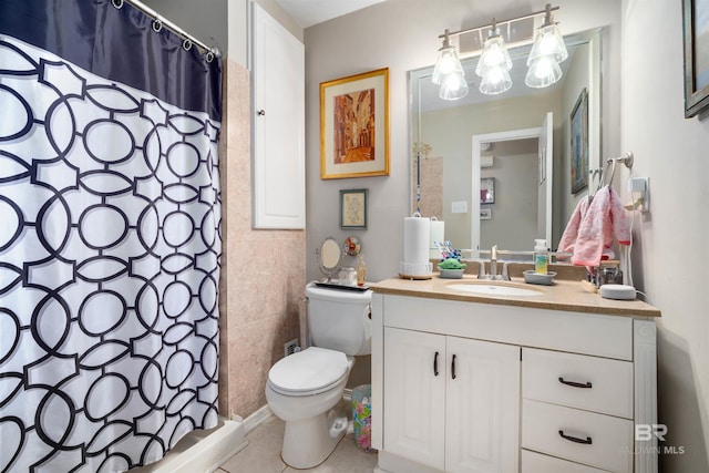 full bath featuring tile patterned flooring, toilet, vanity, a shower with curtain, and tile walls