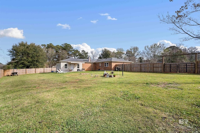 view of yard featuring a fenced backyard