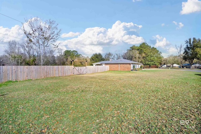 view of yard featuring fence