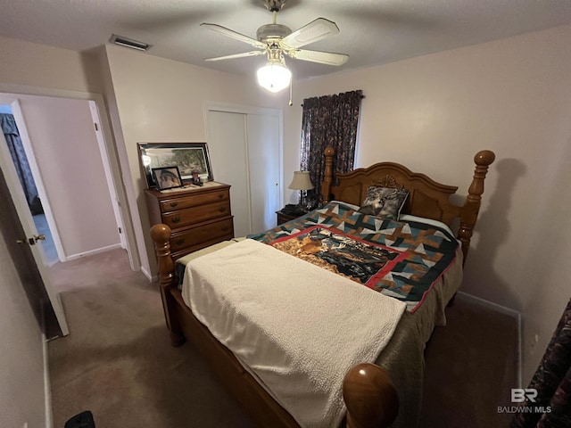 carpeted bedroom featuring ceiling fan and a closet