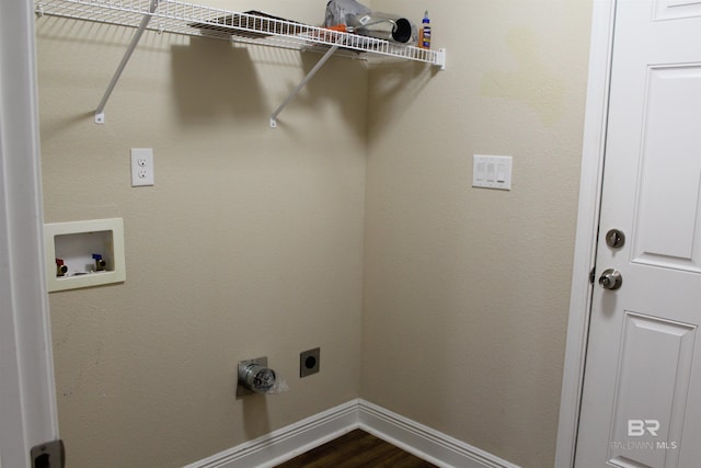 washroom with washer hookup, dark wood finished floors, hookup for an electric dryer, laundry area, and baseboards