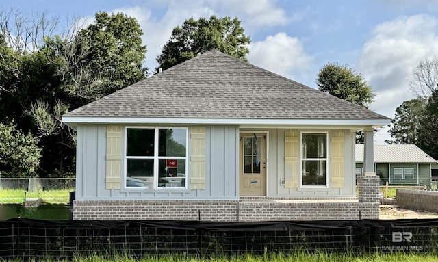 2036 W Union Ave, Loxley, AL 36551 - view of front of house featuring roof with shingles and board and batten siding