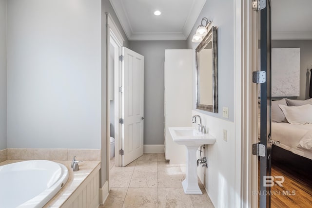 bathroom with tile flooring, a bathtub, and ornamental molding