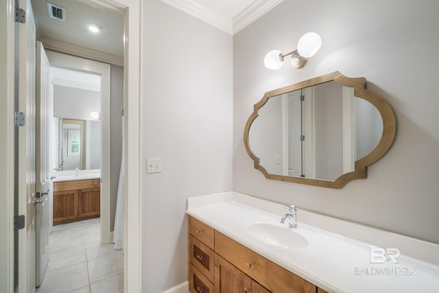 bathroom with crown molding, tile flooring, and large vanity