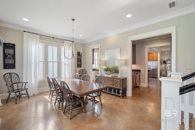 tiled dining area featuring crown molding