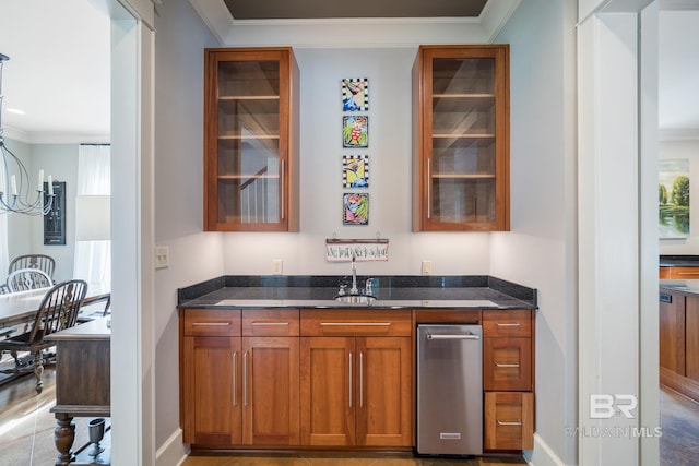 bar with dishwasher, sink, dark stone counters, and crown molding