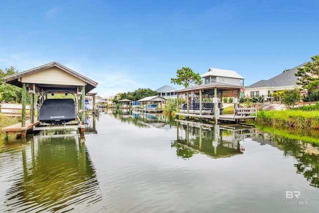 view of dock with a water view