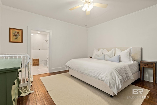 14 Macy Pl, Mobile, AL 36604 - bedroom with ornamental molding, dark wood-style flooring, connected bathroom, and ceiling fan