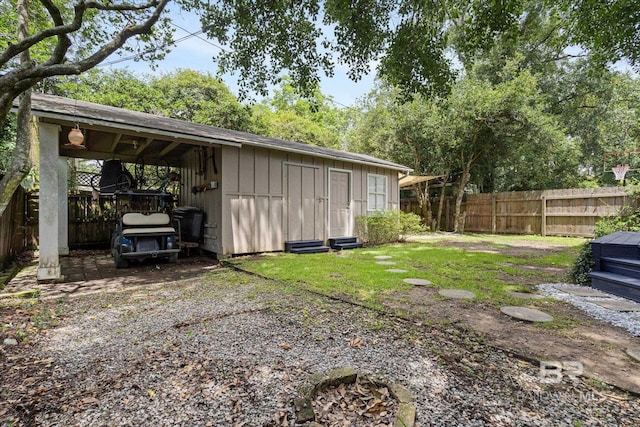 14 Macy Pl, Mobile, AL 36604 - fenced backyard with a shed