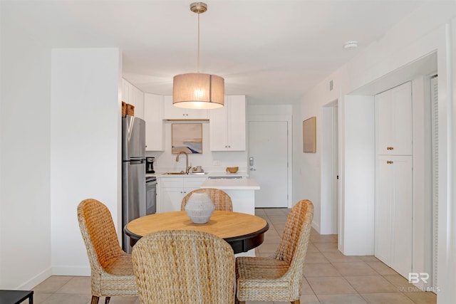 tiled dining area with sink