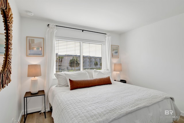 bedroom featuring hardwood / wood-style floors