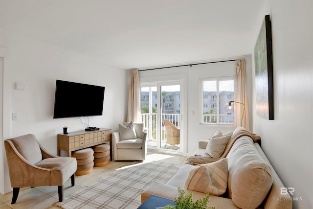 living room with light tile patterned flooring