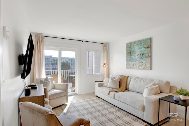 living room featuring light tile patterned floors