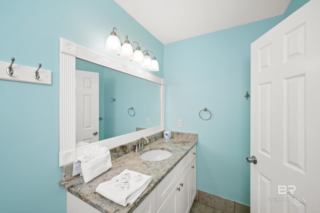 bathroom featuring tile patterned floors and vanity