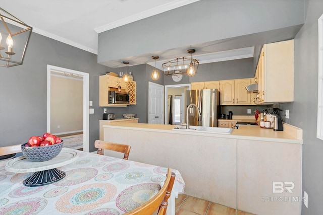 dining area featuring crown molding and light tile patterned flooring