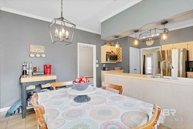 dining space featuring a notable chandelier, crown molding, baseboards, and light tile patterned flooring