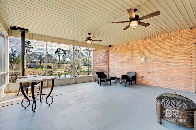 view of patio / terrace featuring ceiling fan