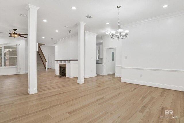 4340 Hamilton Oaks Ln, Mobile, AL 36695 - unfurnished living room featuring ornamental molding, ceiling fan, stairway, recessed lighting, and light wood finished floors