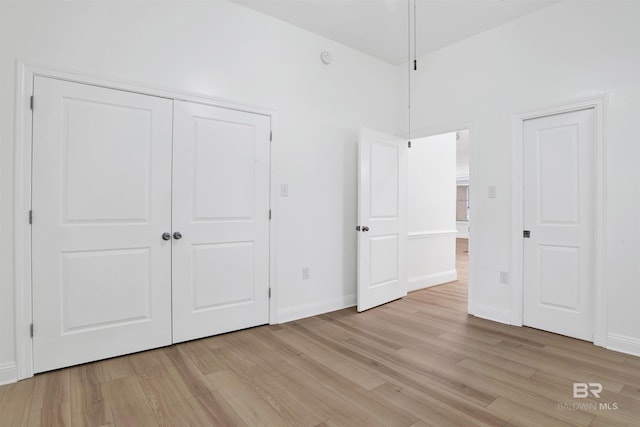 4340 Hamilton Oaks Ln, Mobile, AL 36695 - unfurnished bedroom featuring light wood-style flooring and a closet
