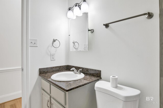 4340 Hamilton Oaks Ln, Mobile, AL 36695 - half bath featuring vanity and wood finished floors
