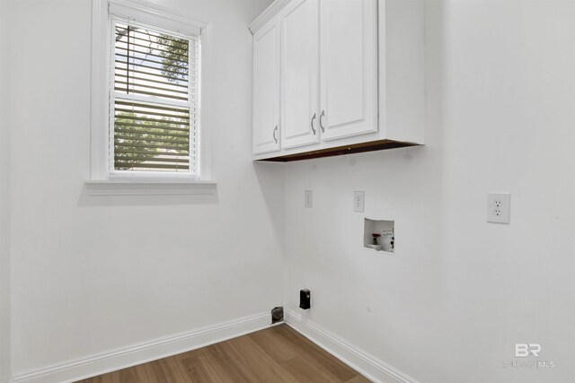 4340 Hamilton Oaks Ln, Mobile, AL 36695 - laundry room featuring cabinet space, hookup for a washing machine, and wood finished floors