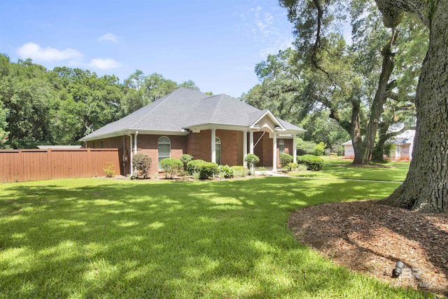 4340 Hamilton Oaks Ln, Mobile, AL 36695 - view of home's exterior featuring brick siding and roof with shingles