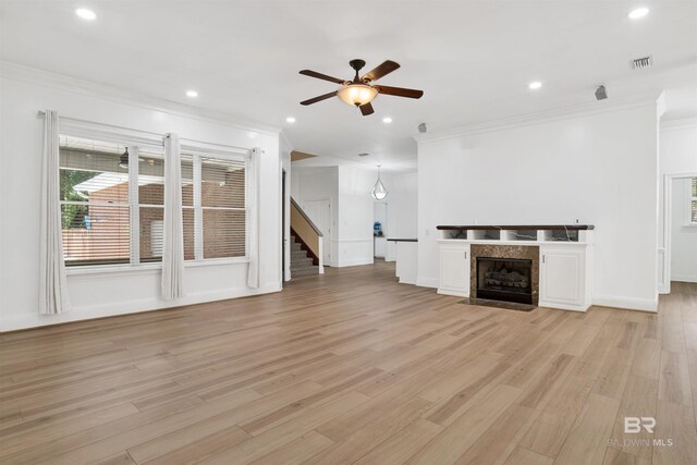 4340 Hamilton Oaks Ln, Mobile, AL 36695 - unfurnished living room with crown molding, ceiling fan, light wood-type flooring, recessed lighting, and stairway