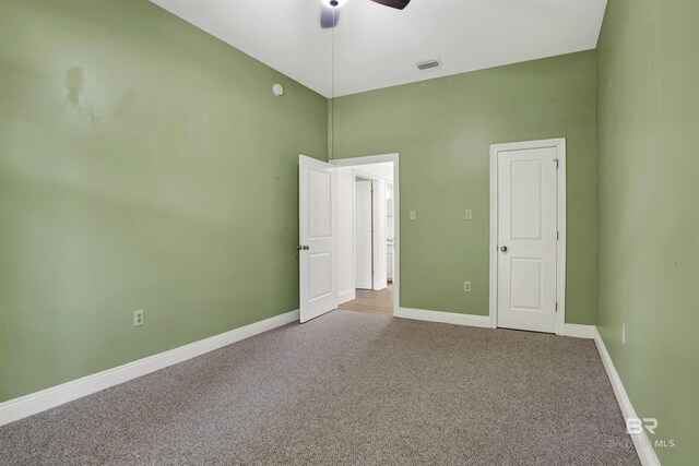 4340 Hamilton Oaks Ln, Mobile, AL 36695 - unfurnished bedroom with carpet flooring, a high ceiling, and a ceiling fan
