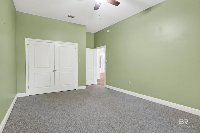 4340 Hamilton Oaks Ln, Mobile, AL 36695 - unfurnished bedroom with carpet, a closet, and ceiling fan