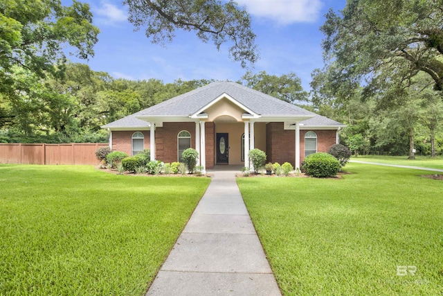4340 Hamilton Oaks Ln, Mobile, AL 36695 - ranch-style home featuring brick siding, a porch, and a shingled roof