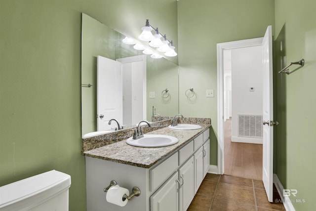 4340 Hamilton Oaks Ln, Mobile, AL 36695 - bathroom with double vanity and tile patterned flooring