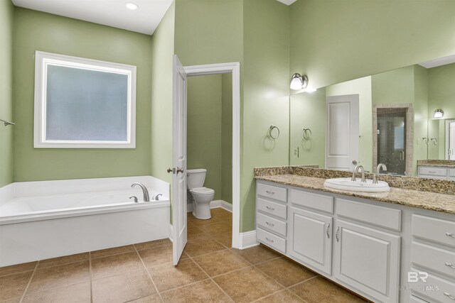 4340 Hamilton Oaks Ln, Mobile, AL 36695 - bathroom featuring a garden tub, vanity, a stall shower, and tile patterned flooring