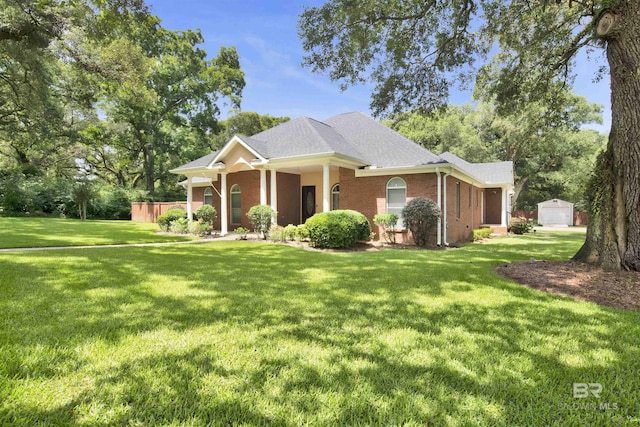 4340 Hamilton Oaks Ln, Mobile, AL 36695 - view of front facade featuring a front lawn and an outdoor structure