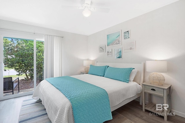 325 E 22nd Ave Unit 4, Gulf Shores, AL 36542 - bedroom featuring a ceiling fan, access to outside, and wood finished floors