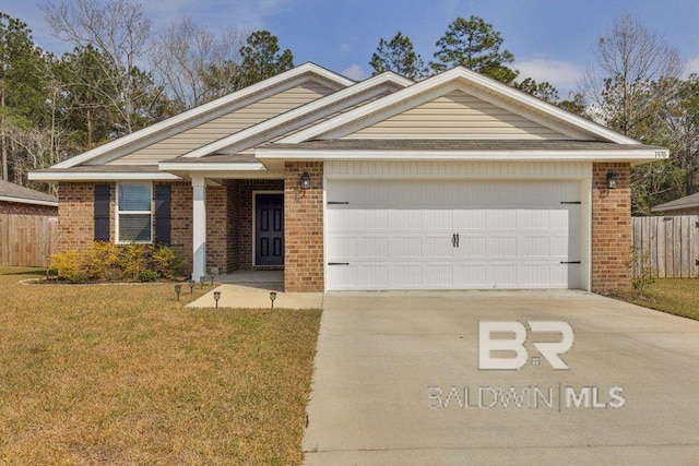 ranch-style house with driveway, a front yard, fence, and brick siding