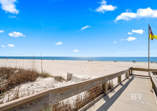 property view of water featuring a beach view