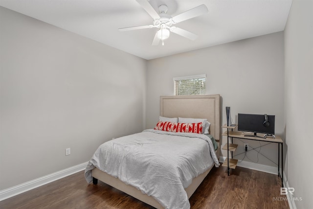 bedroom featuring ceiling fan and dark hardwood / wood-style floors