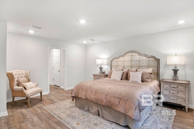 bedroom with light hardwood / wood-style flooring